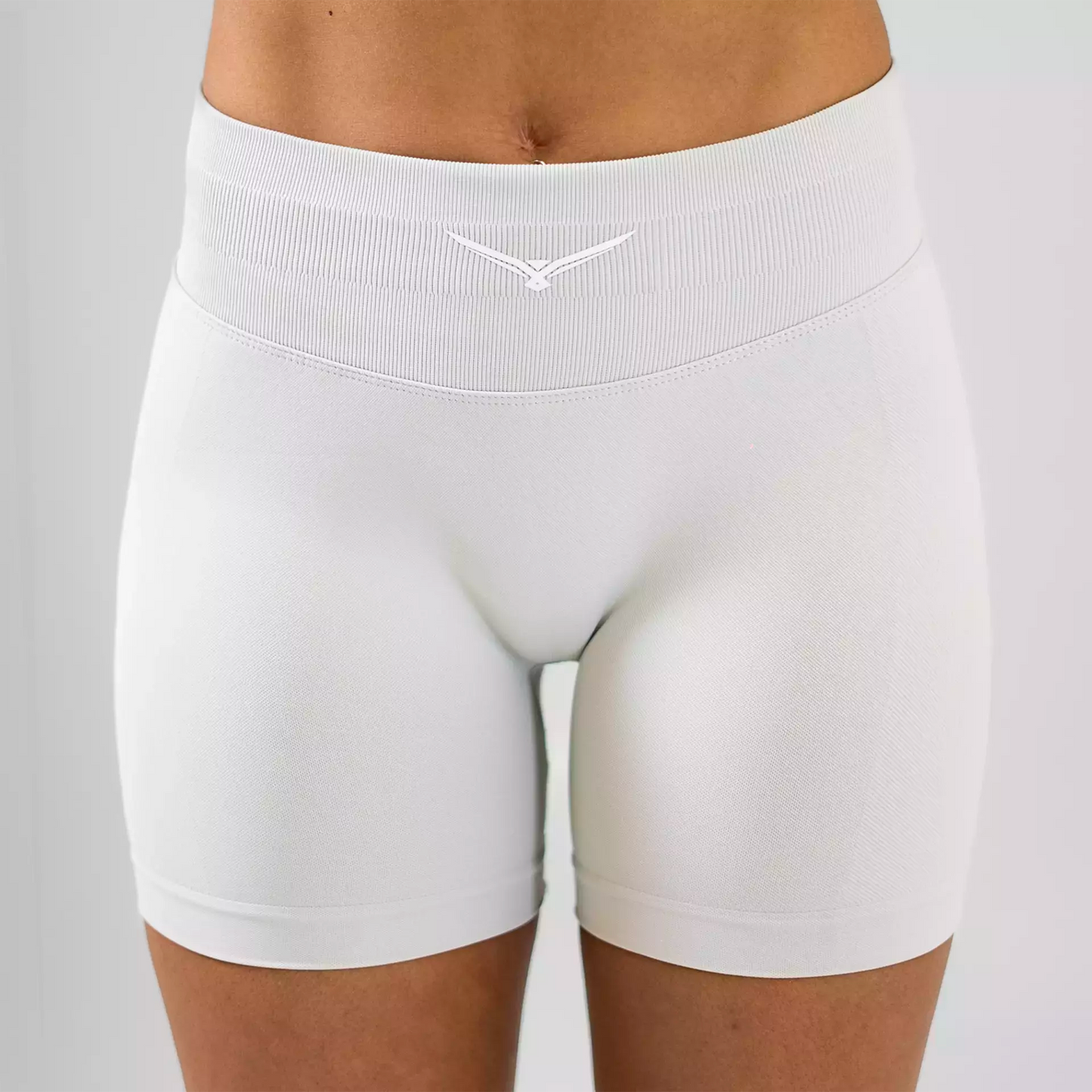 HARDMOND Style Shorts in beige - front view showing high waist design and minimalist style