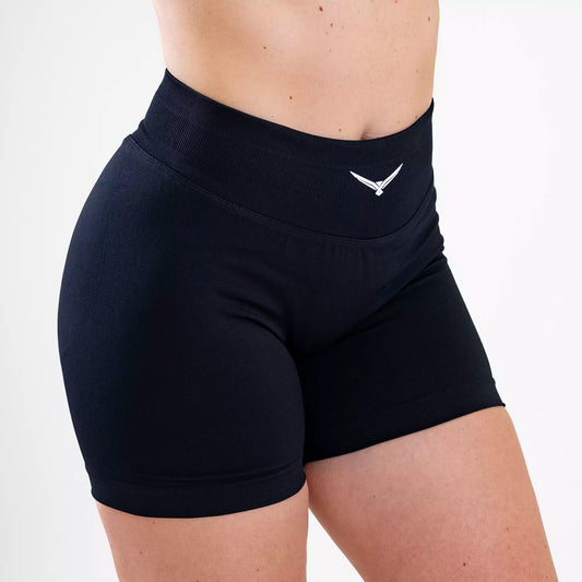 Model wearing HARDMOND Style Shorts in black during fitness activity
