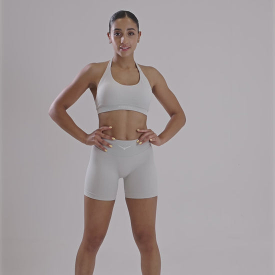 Video showcasing HARDMOND Style Bra in beige with open back design and removable padding
