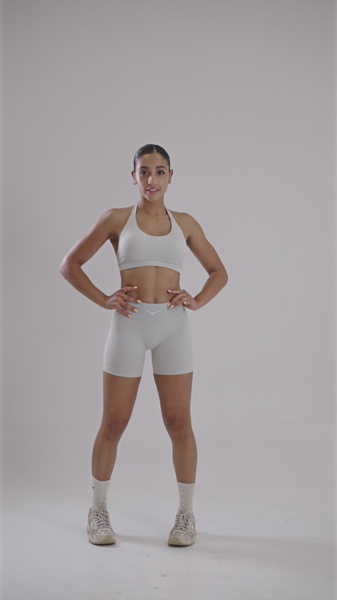 Video showcasing HARDMOND Style Bra in beige with open back design and removable padding

